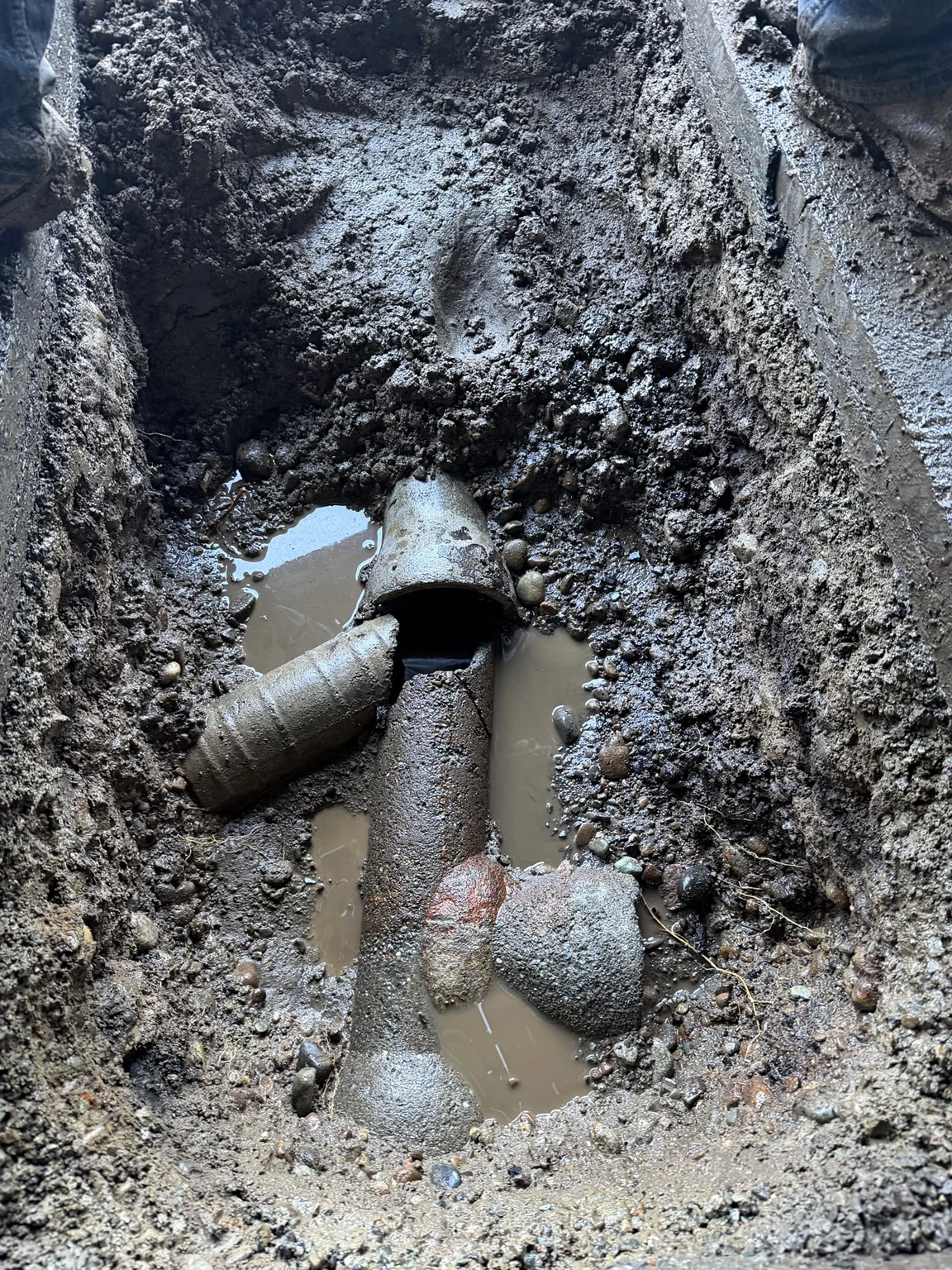 Broken pipe exposed: Storm pipe repair & driveway drainage in Kirkland, Washington — view 2