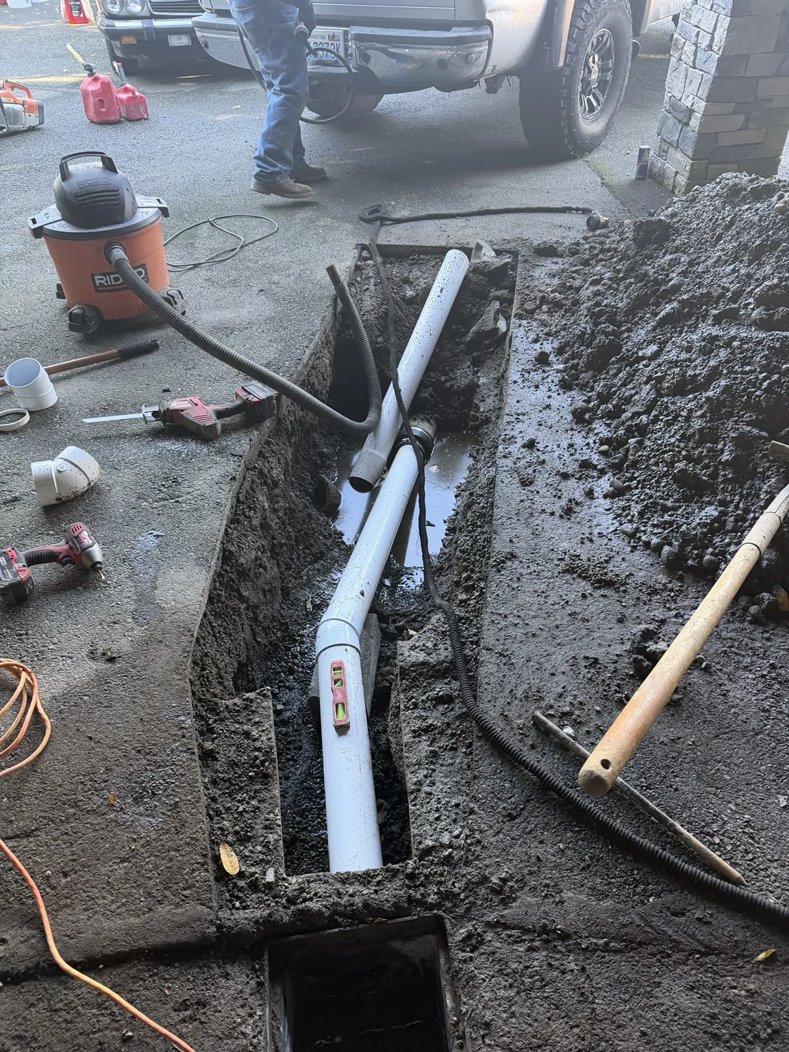 Replacement storm line: Storm pipe repair & driveway drainage in Kirkland, Washington — view 3