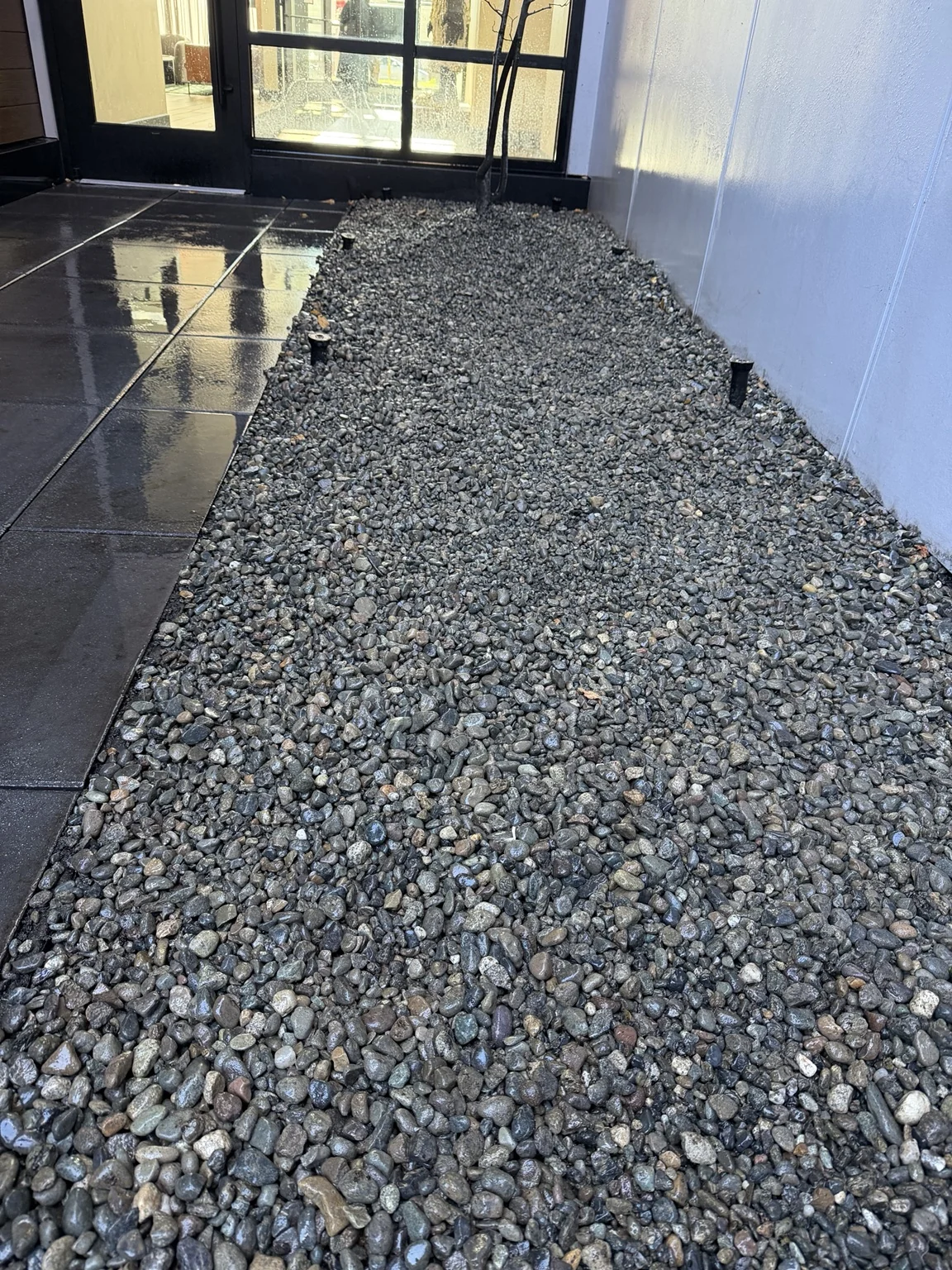Completed: Tapestry apartment garden bed rock conversion in Seattle, Washington — view 4